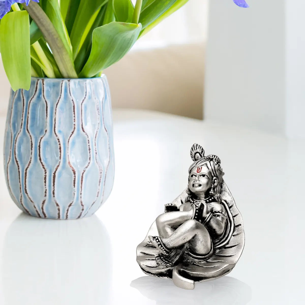 Bal Krishna In Leaf - Antique Silver Idol
