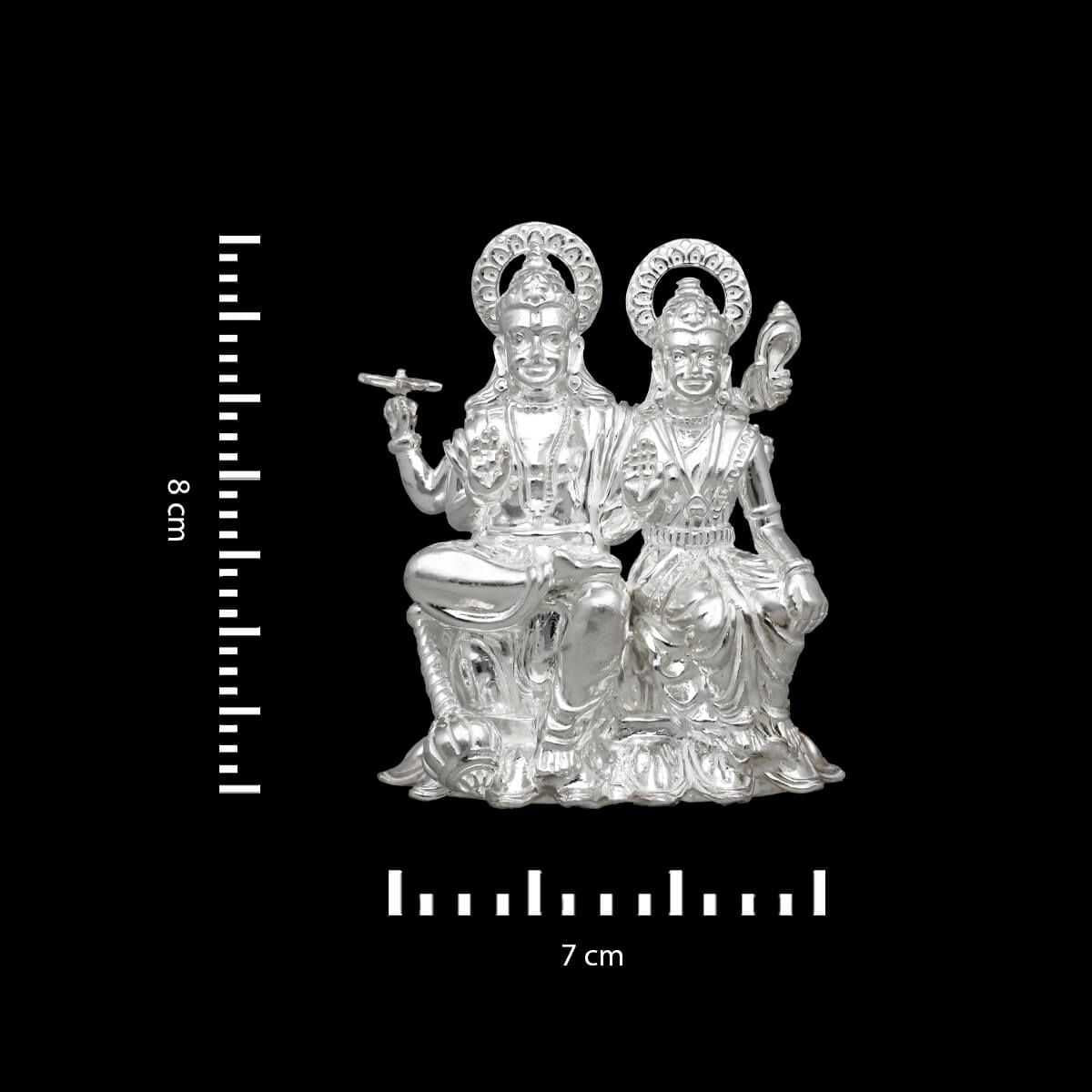 silver vishnu lakshmi idol