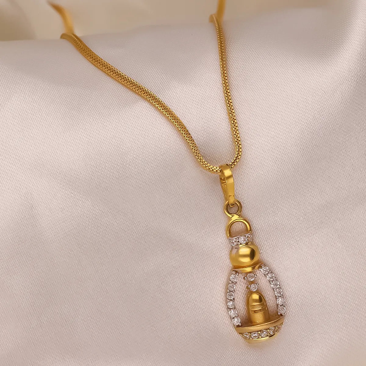 Gold 2025 shivling pendant