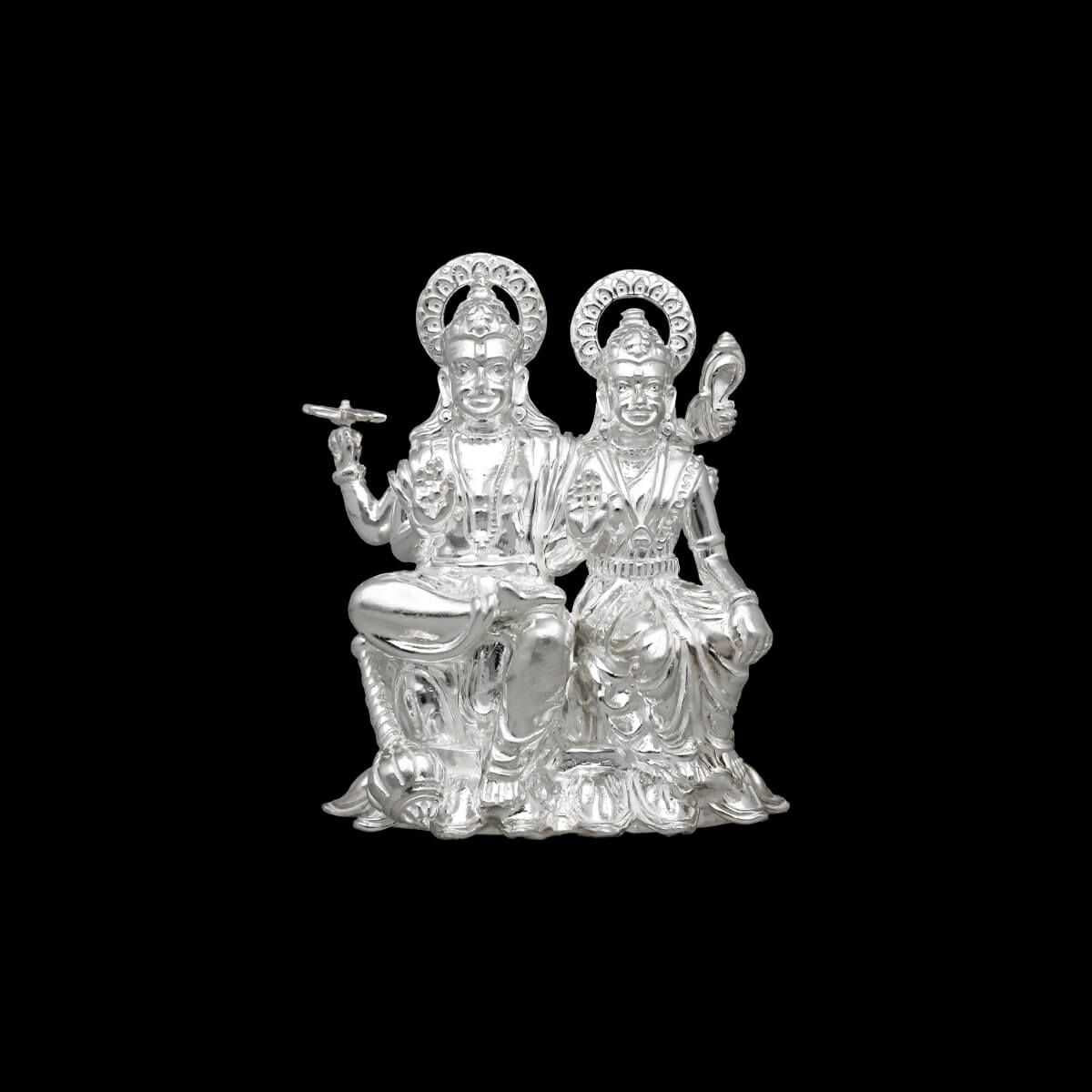 silver vishnu lakshmi idol